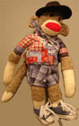 sock monkey,boy scout,cowboy monkey